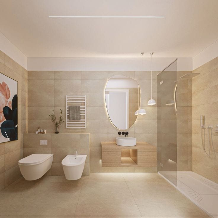 Bagno completo rifatto a Lugano con rivestimenti in gres beige, doccia walk-in e mobile sospeso