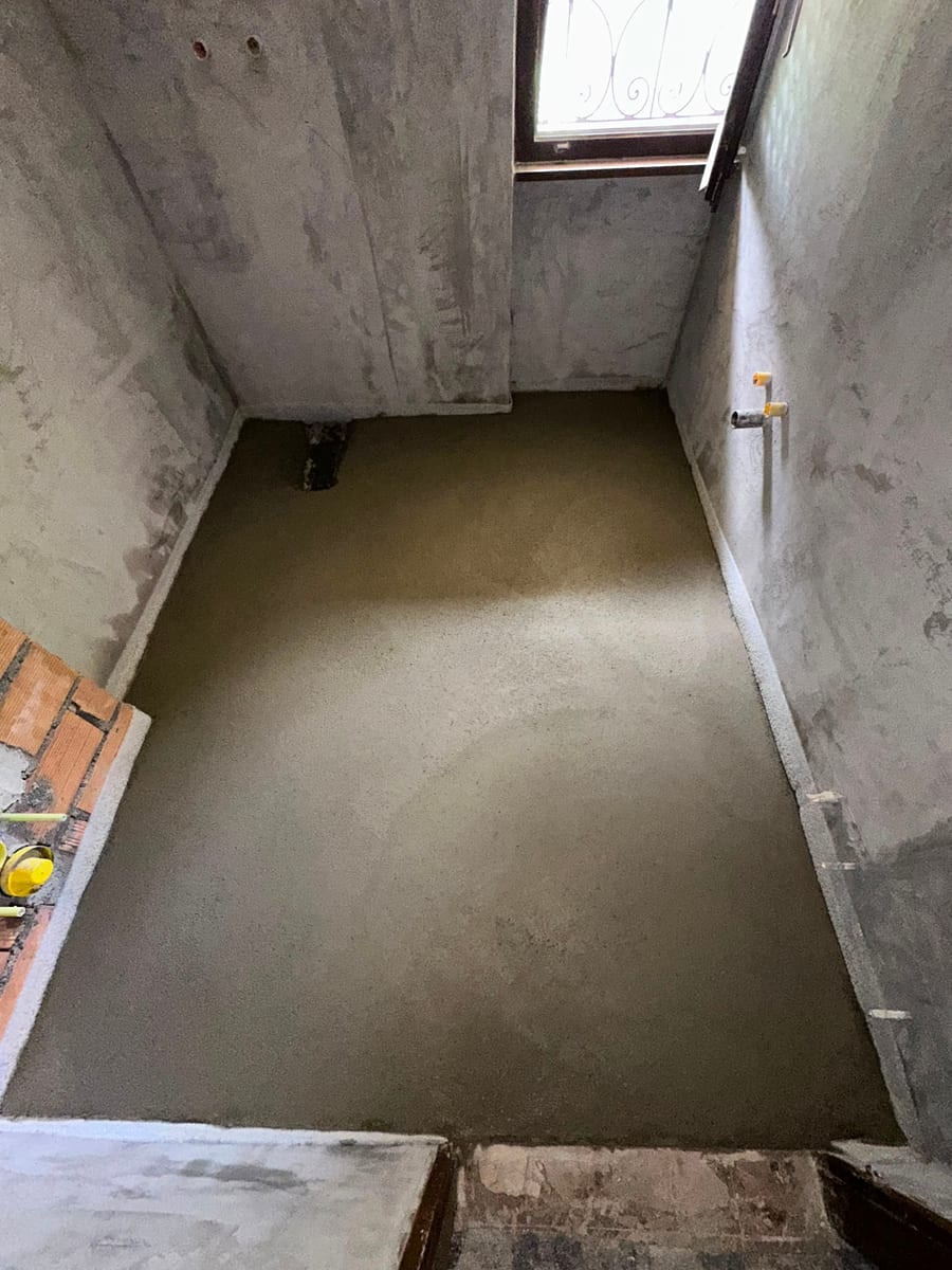 Dopo — rifacimento del sottofondo e getto del massetto prima della posa del pavimento in Ticino